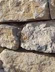warm appearance and texture and ability to blend into the natural landscape Purbeck stone - for its versatile use (surfacing, edging, sculptural elements) and therefore its ability to unify different