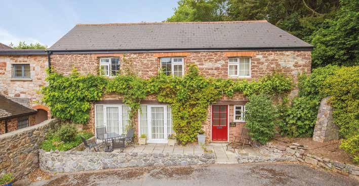Manor Lodge Manor Lodge This property is attached at one narrow section to the main house. It has a spacious living room on the ground floor, along with a kitchen, cloak room and store.
