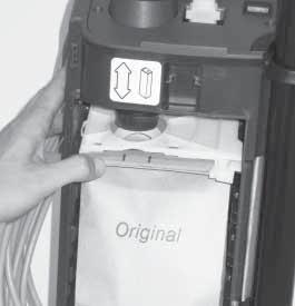 Insert a new paper dust bag into the slot of the bag holder and push the bag in place.