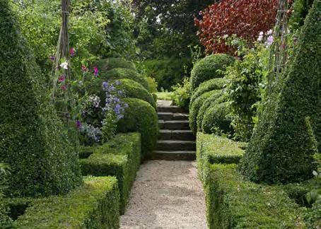 Designed 20 years ago by the previous owners, garden designers Julian and Isabel Bannerman, the present owners have recently made a full and sensitive restoration of this