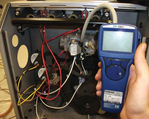 42 NEVER ADJUST THE INPUT OF THE FURNACE TO EXCEED THE INPUT SHOWN ON THE RATING PLATE. FIGURE 30 - MANOMETER MEASURING GAS MANIFOLD PRESSURE Heating Value of Gas x 3600 Input = Time in Sec. for 1 cu.