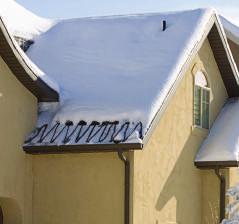 ROOF & GUTTER DE-ICING Raychem roof & gutter de-icing systems protect roofs and gutters from ice dams, heavy snow build-up, and icicles.