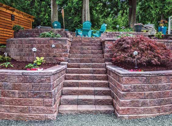 Landscaping. 2 1. Retaining Walls and Steps: ManorStone in Rustic Blend. 2. Planters: Ground Face Concrete Masonry Units in Charcoal.