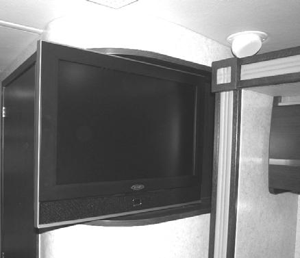 12-Volt TV Master Power Switch (Located in overhead cabinet or on a wall near the TV) -Typical installation shown NOTE: When the TV is not in use, the 12-Volt TV Master Power switch should be turned
