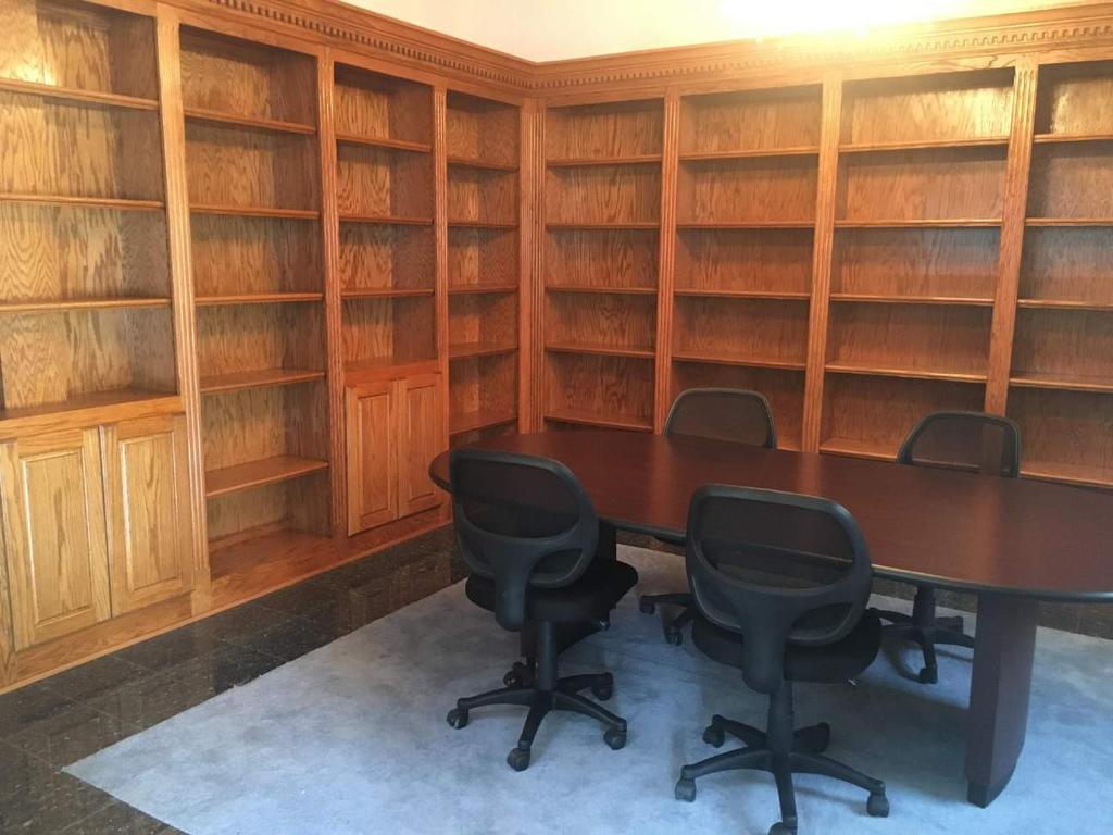 MAIN LOBBY LIBRARY CONFRENCE ROOM- CUSTOM BUILT-IN, SOLID OAK BOOK CASES, GRANITE AND CARPET