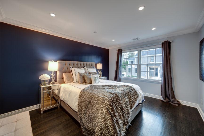 The Master Suite is functionally designed with generous Dual Walk-In Closets with custom storage and a spa-like Master