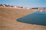Cost: Varies NAHB Reference: Pages 20-21 Sediment Basin Functions as a small settling pond for sediment