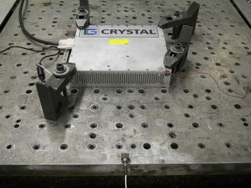 Photograph 4-4: Test unit secured to the slip plate and ready for testing in the X-axis.
