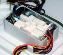 It is inserted in 2 guides at the rear and held in place by a single Phillips-head screw at the front. To remove the inverter: Remove the service panel. (See Service Panel.
