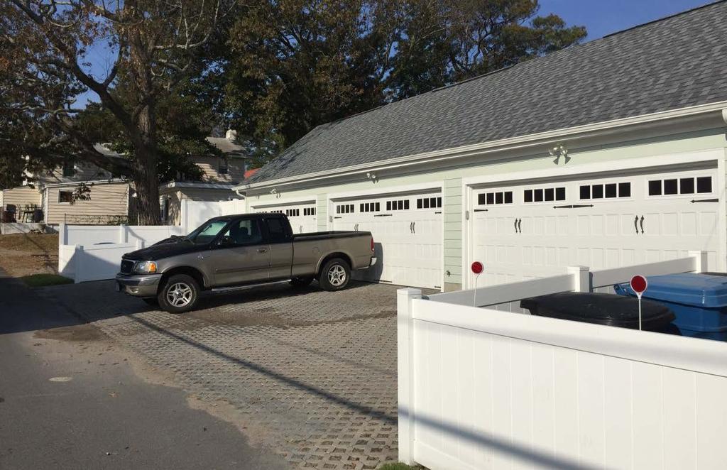 GARAGES Garages should not act as a focal point and should be located on the side or the rear of the property. Two-car garage doors are discouraged.