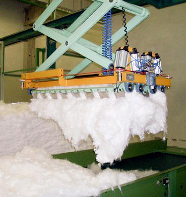 Automatic Bale Plucker is used to mechanically strip fibres from pressed bales and automatically drop the fibre on to the feed table of the opening machinery