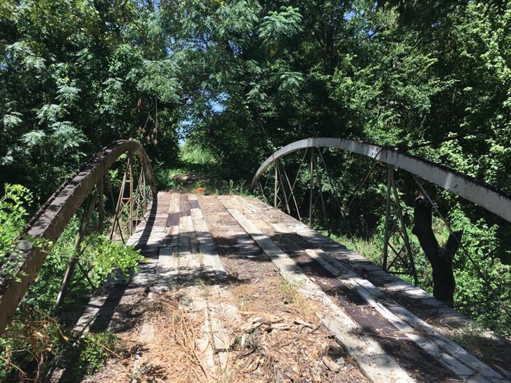Announcement The Texas Department of Transportation (TxDOT) is offering the historic bridge detailed below for adoption and reuse according to federal transportation and historic preservation laws.