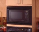 MICROWAVE OVENS This trim kit allows for built-in installation of the 1.8 countertop microwave oven in a wall or cabinet alone, or over a 30" single electric wall oven as shown.