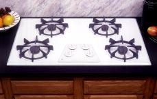BUILT-IN COOKTOPS: 36" AND 30" GAS ALL MODELS INCLUDE Sealed burners (except JGP320EV) Electronic pilotless ignition Profile Performance Series JGP960SEA Stainless steel 36" cooktop Tempered
