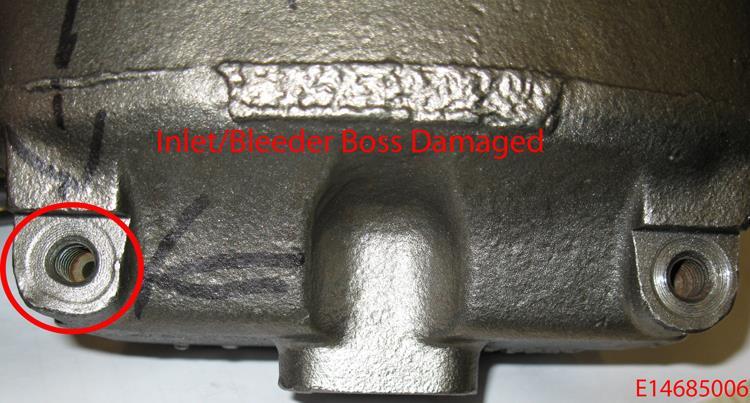 REJECT If the inlet boss (machined area of the casting where the inlet or