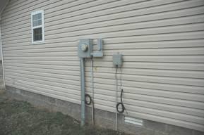 Electrical System Description The service to the home is underground. The service and meter base is located on the left exterior wall of the home. The service panel is located in the utility room.
