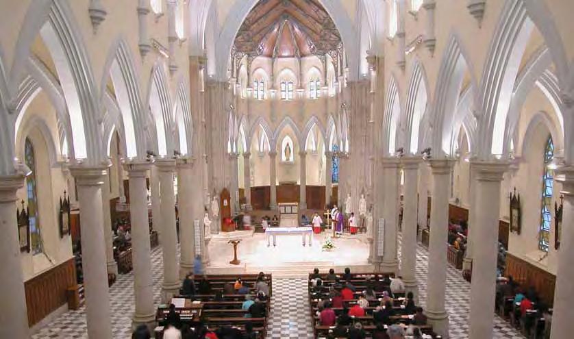 Catholic Cathedral of the Immaculate Conception / 2003 Above: Services continued during restoration works. Left: The new scheme provided better illumination and highlighted the interior Gothic arches.