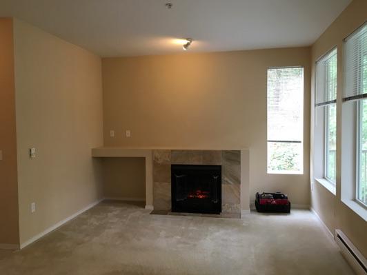 1. Living Room Living Room Walls and ceilings appear in good condition overall.