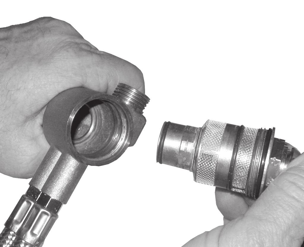 Use a adjustable wrench to unthread THERMOSTATIC CARTRIDGE () from housing. Fig. 8d. 7.