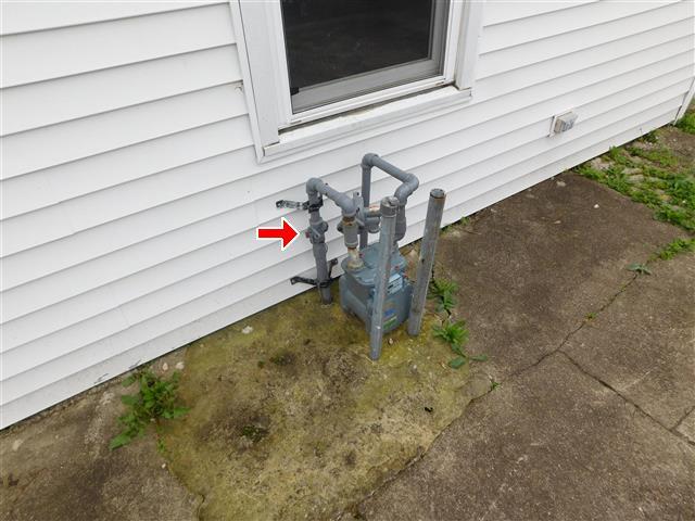 6.4 The main fuel shut off is at gas meter outside. 6.4 Item 1(Picture) The plumbing in the home was inspected and reported on with the above information.