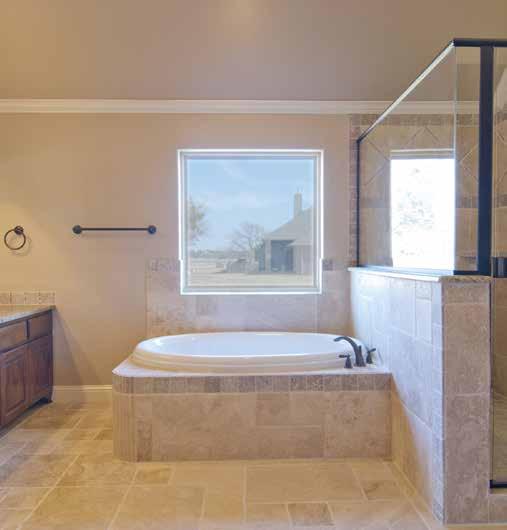 tub surround & ceiling Deco tile allowance for tub area Corner tile shelves MASTER ALSO INCLUDES Travertine flooring Travertine shower and tub surround