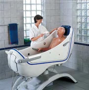 comfort and safety: In the reclined position, the bath's smooth molded contours and head rest comfortably support the resident.