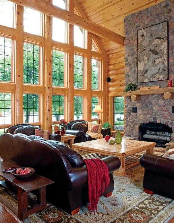 The great room gable features log-trimmed windows that flood the room with light and frame the lake view.