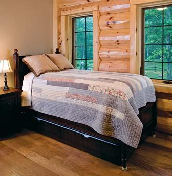 RIGHT: Logs and drywall interplay in this upper-level bedroom.