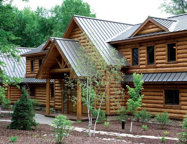 home details SQUARE FOOTAGE: 5,285 LOG COMPANY: Wisconsin Log Homes ABOVE: The front of the lodge-style vacation home shows off the snow-shedding metal roof that adds further interest to the