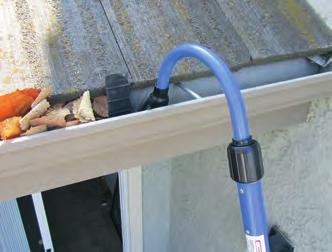 Rinsing the Gutter: Remove the Right Angle Gear Assembly with Paddle Brush from the curved tube and