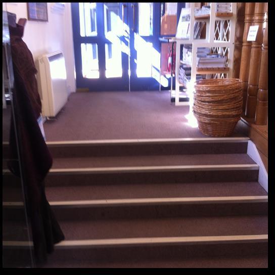 Stairs leading to the shop First entrance door is 115 cm/45 ins wide and