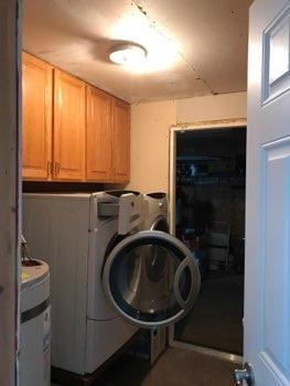 1. Condition Laundry Ceiling and walls are unfinished.
