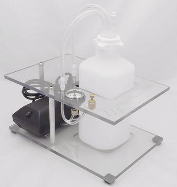 Introduction The vacuum waste kit, VWK-2, is designed to assist in the removal of fluid from cell preparations. It provides approximately -0.4 Bar of suction and can trap nearly 2L of fluid.