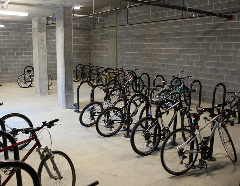 Bike racks should be located in visible areas in close proximity to building entrances, park and recreational
