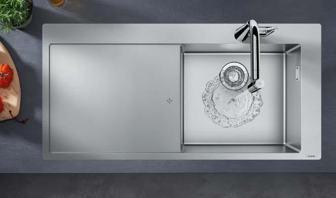 hansgrohekitchensink_s715_f450_ambience01 The hansgrohe built-in sink with an integrated drain board is suitable for base cabinets with widths of 60 centimetres or more.
