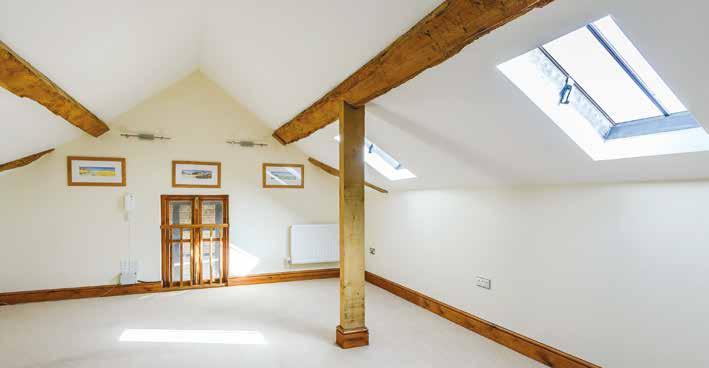 ceiling, window overlooking rear courtyard garden and ENSUITE with corner bath, shower fitting,