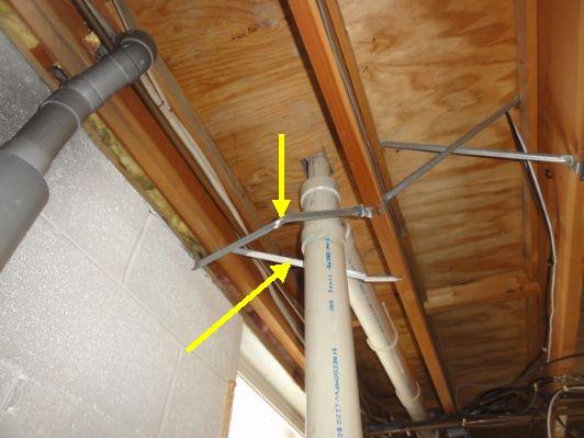 A couple floor joist braces were partially removed, probably for