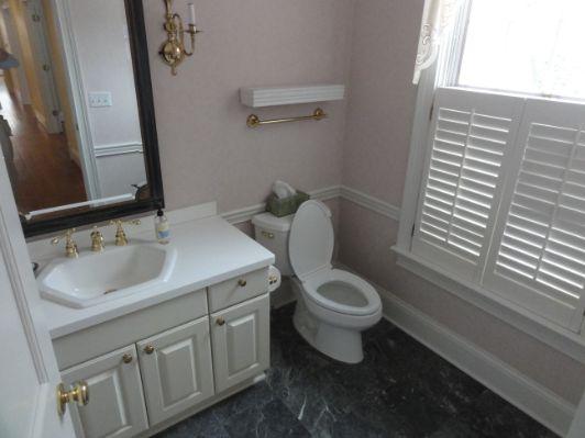 1. General FYI Half Bath Half bath 2. Bathroom Sinks, Counter Tops, Cabinets This bathroom sink appeared to be in serviceable condition at the time of the inspection.