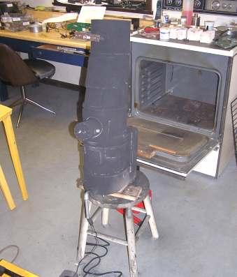 Painting Boiler: The first step was to give the boiler a quick final blast and then set it in the backhead and spray on the powder.
