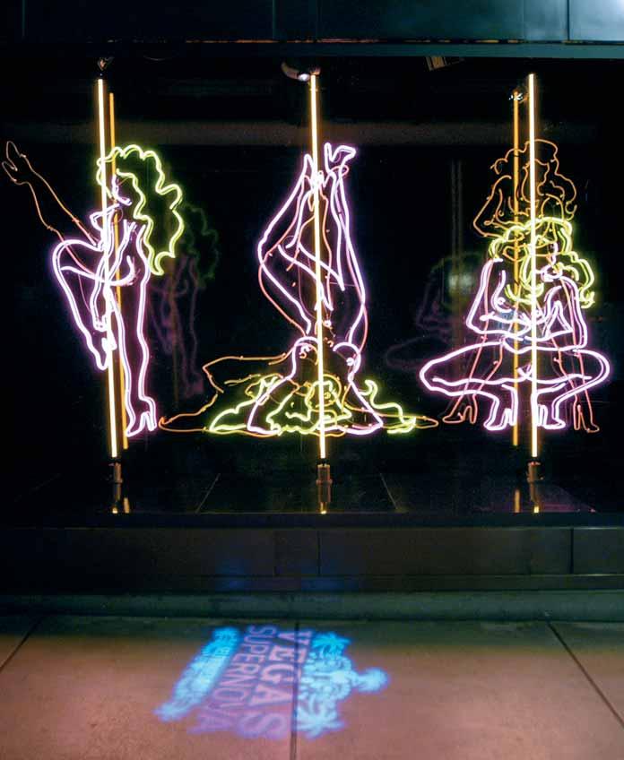 Windows 65 Selfridges Vegas Supernova window scheme in London, here featuring neon pole dancers, was inspired by the city s centenary and the Vegas-like