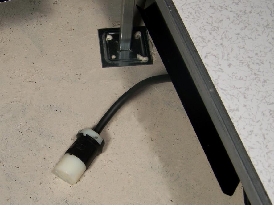 It may be necessary to install a screw in the pedestal head on which to hook the unit for hanging. Figure 5 - Alternative Corner Lock Hangers Figure 6 Power Outlet from Site Source 4.