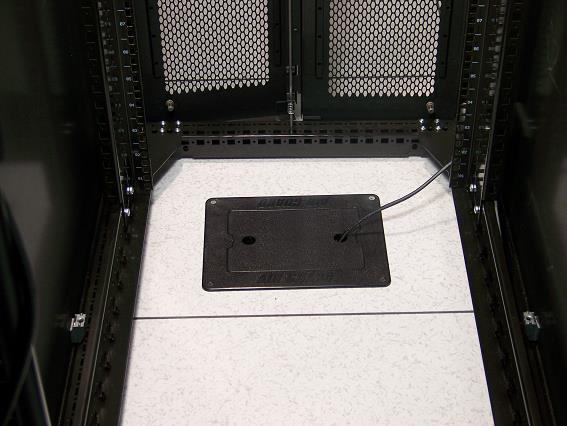 the inside surface of the door, while the door is completely open to ensure sufficient slack. Zip tie the cable trunk along the rack frame or where appropriate.