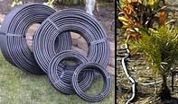 ), how thick the wall of the tubing is, how densely you pack the coils into the trench and the type of soil.