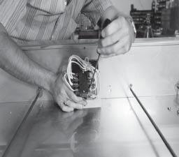 Remove the four screws securing the access panel and remove panel. To avoid electrical shock, make connections before applying power, take reading, and remove power before removing meter leads.