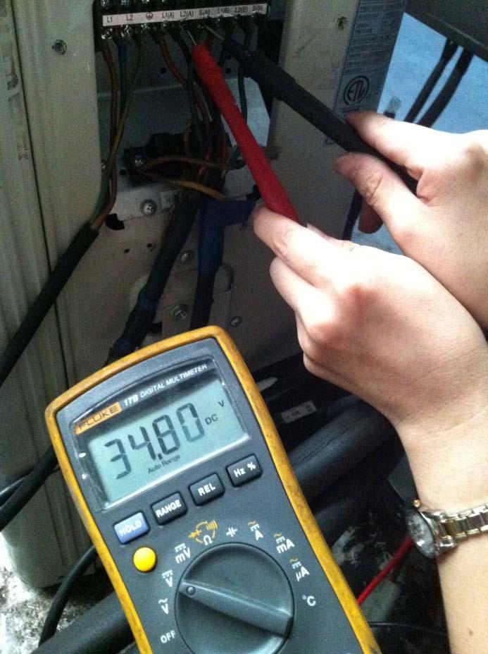Pic 1: Use a multimeter to test the DC voltage between 2 (previously: L2) port and S port of outdoor unit.