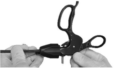 movable handle in Disengaged mode (See Figure 4) Figure 4: Step 2: Grasp the rotation assembly with one hand to keep it from turning