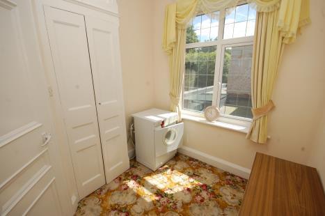 6 SEPARATE WC: INNER LOBBY: BEDROOM 5: Low-level suite, radiator, leaded light stained glass window, door through to: