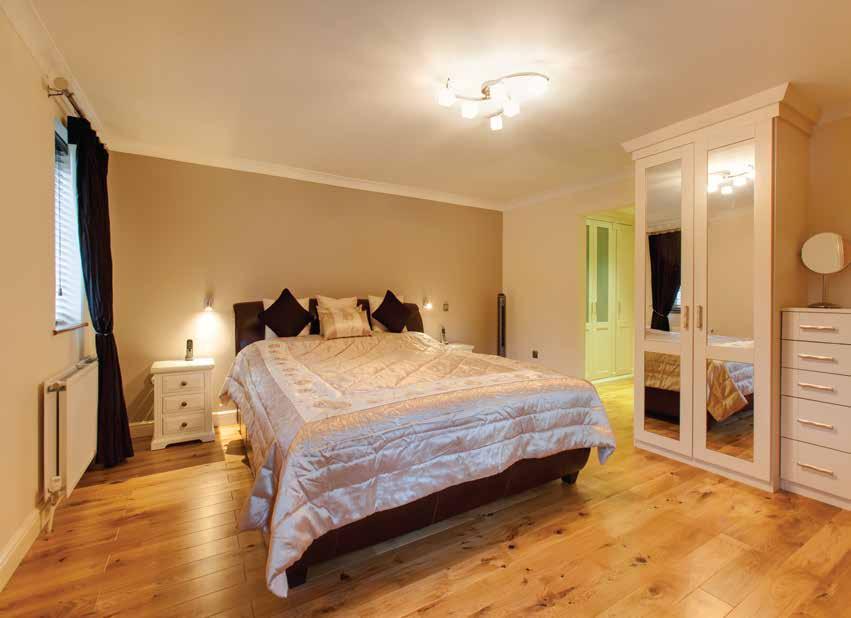 6m) A generously sized room with a rear facing UPVC double glazed window, coved ceiling, central