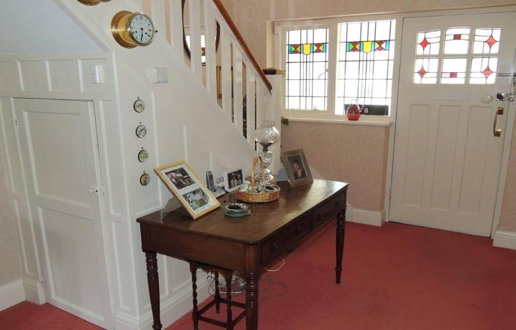 FIRST FLOOR GALLERY LANDING A spacious landing which is part carpeted and part wooden flooring, UPVC double glazed window to the front elevation, telephone point and a gas central heating radiator