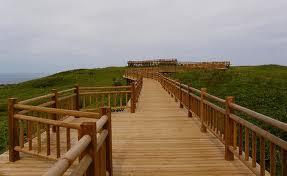 Independence board walk : is accessible wooden path in nature. It costs less than 1/10. Basically, the budget is from donation and volunteer work.